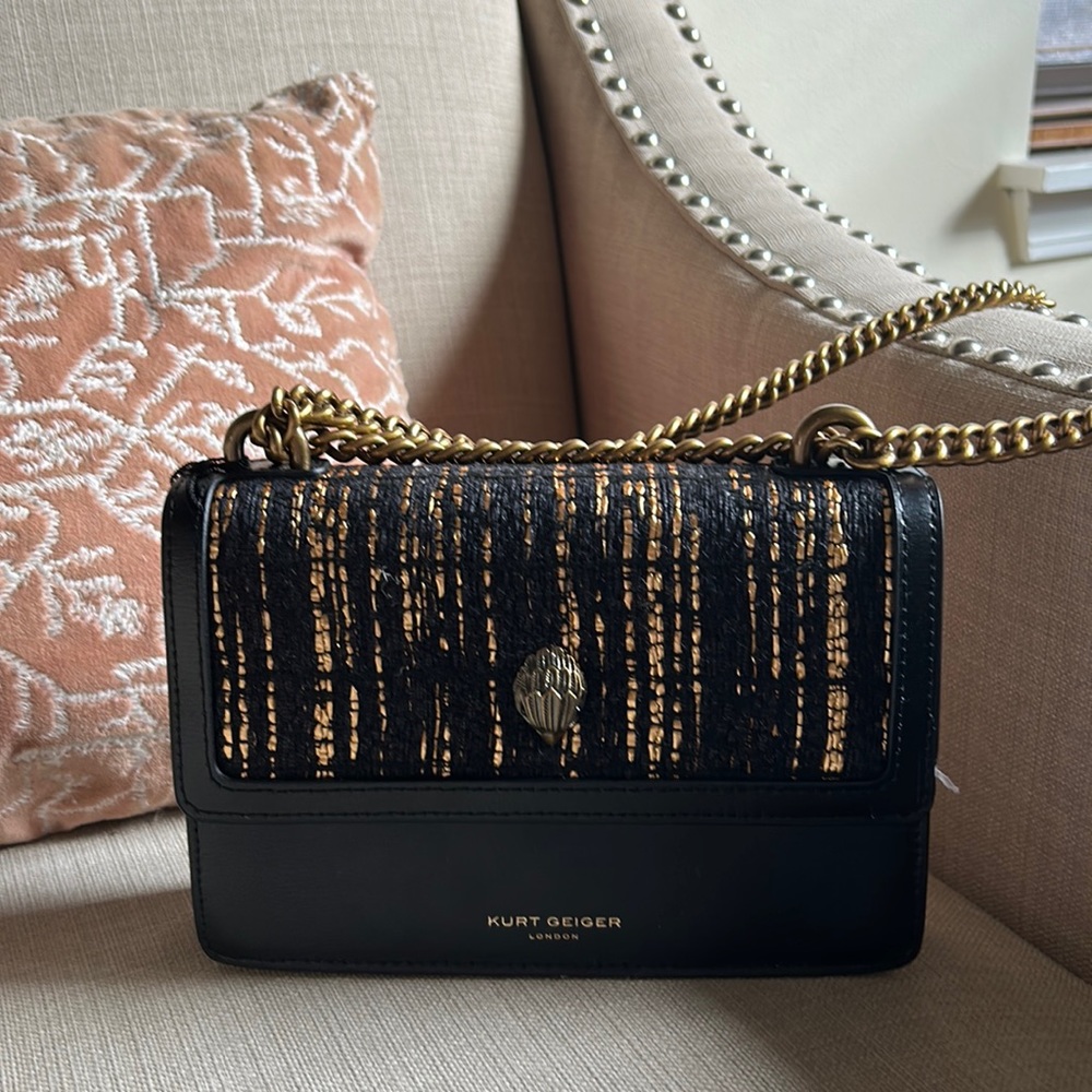Kurt Geiger genuine leather Crossbody clutch with chain strap. Gold stitching.